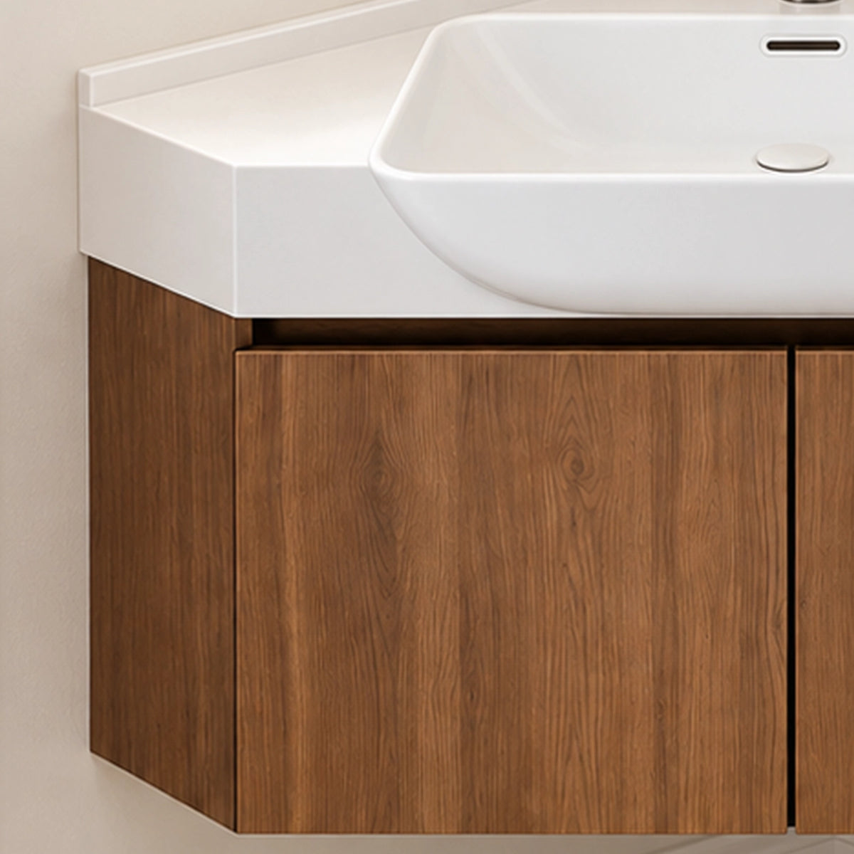 Partial view of vanity cabinet, handle‑less flat walnut wood‑grain door