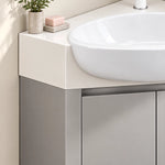 Corner vanity counter close‑up, white countertop with soap and small potted plant