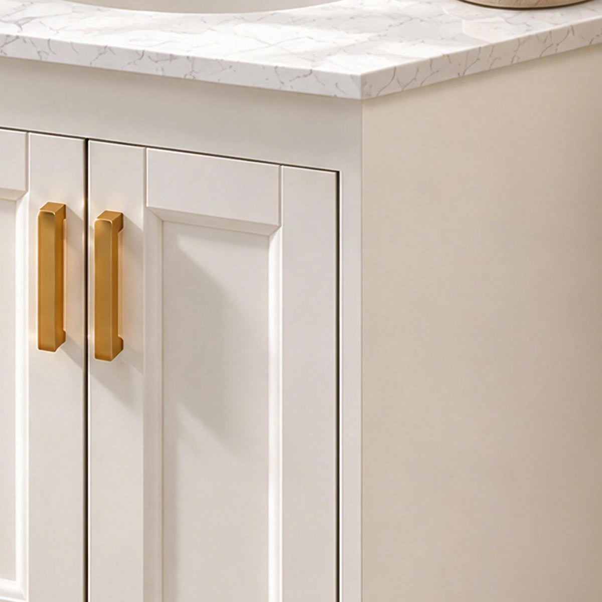 Vanity cabinet door close‑up, white raised‑panel door with long gold pulls