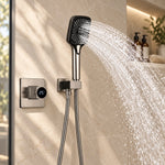Close‑up of digital display handheld shower head, water spraying