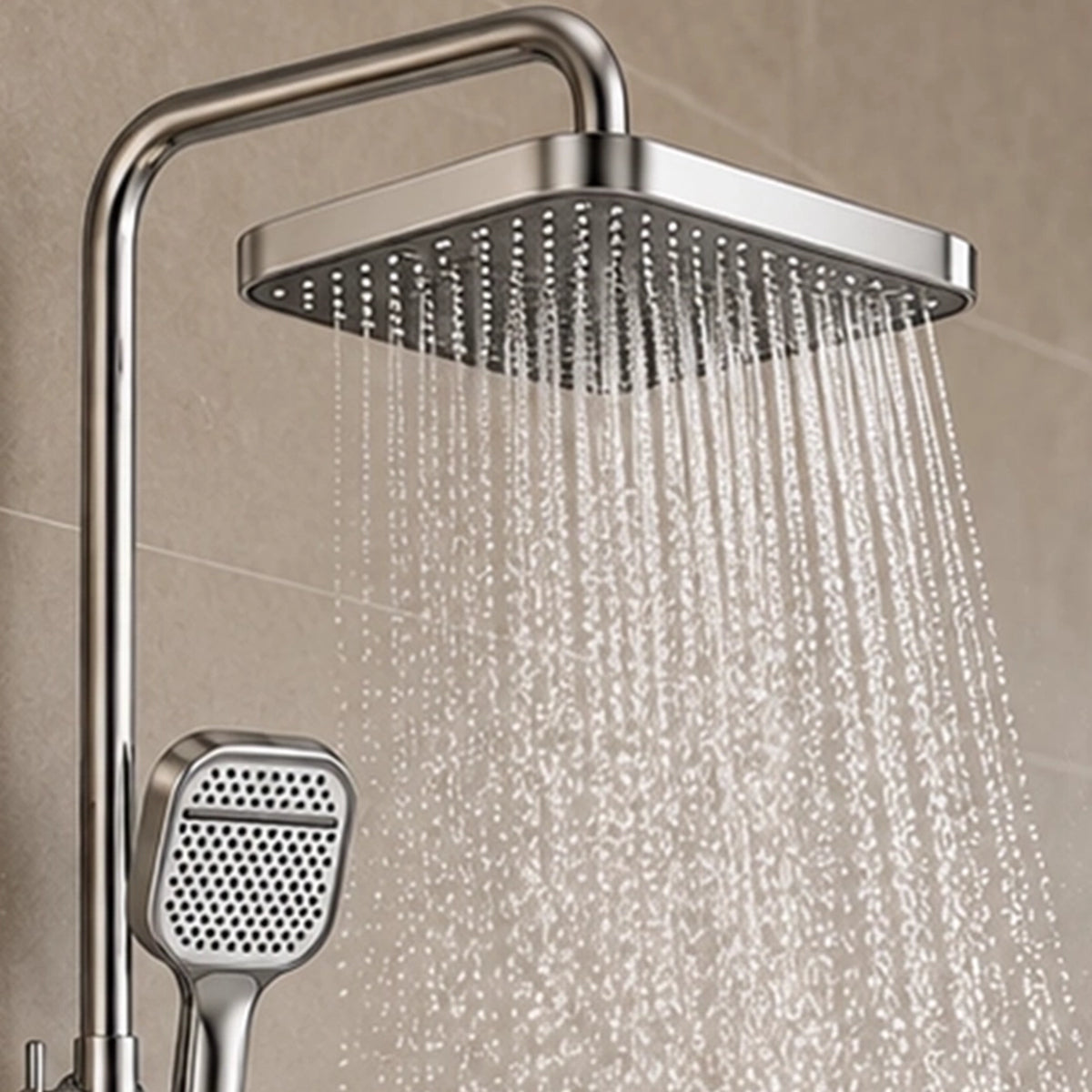 Close‑up of large square rainfall shower head spraying water
