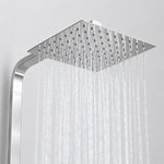 Close‑up of square rain shower head with heavy rainfall water flow
