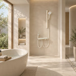 Cream‑tone shower unit, real‑shot bathroom with freestanding bathtub & large window