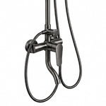 Close‑up of shower mixing valve, metal body and flexible hoses