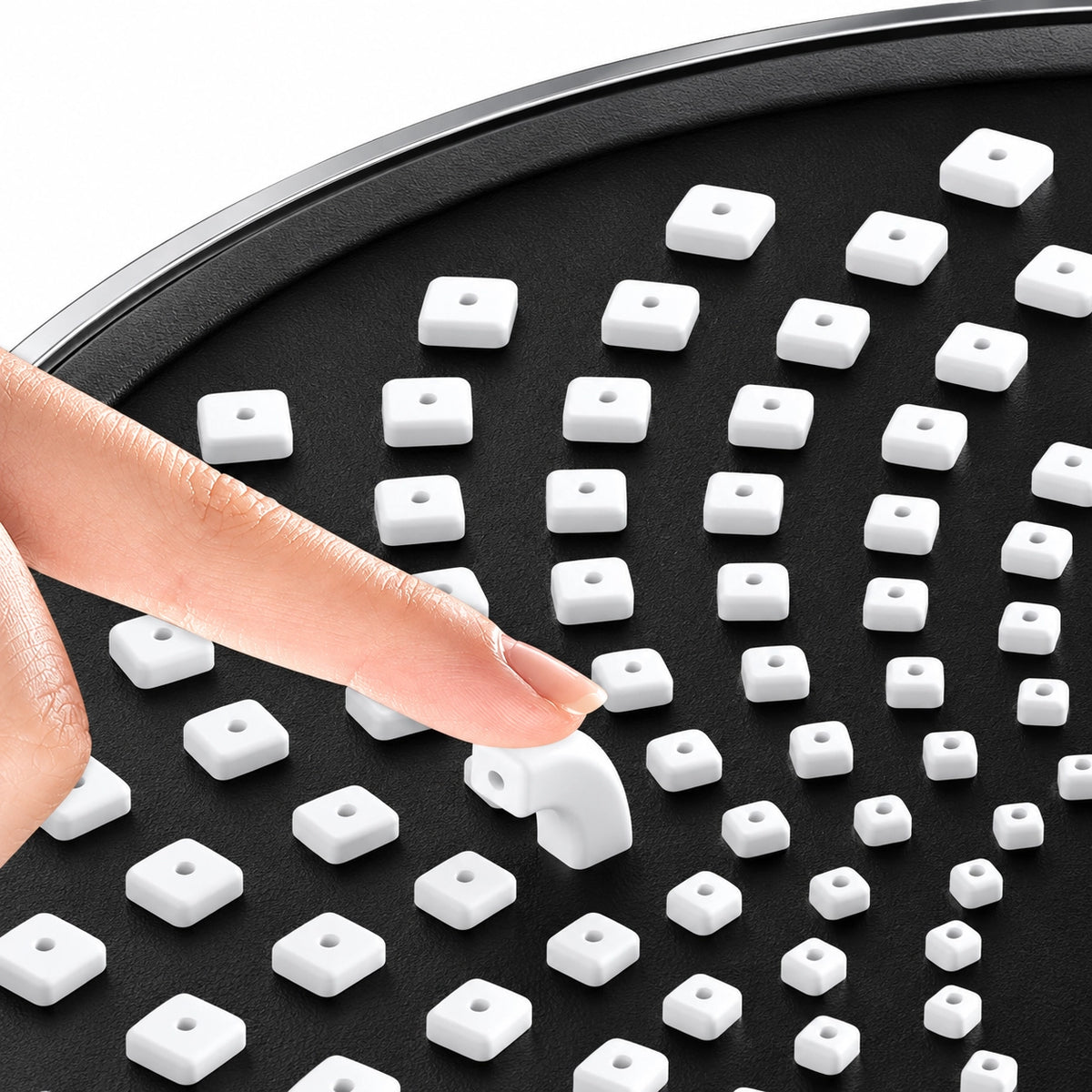 Silicone nozzles on overhead shower, removable anti‑clog rubber tips