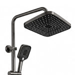 Square overhead shower paired with handheld, curved pipe connection