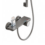 Close‑up shower shelf, control knob and hot‑cold indicator marks
