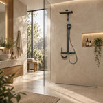 Gray thermostatic shower system, display in bright bathroom with large window