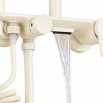 Shower valve outlet close‑up, bottom water flow display