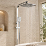 Silver dual-function shower system, in stone bathroom with recessed niche