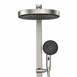 Close‑up, gunmetal round rain head and multi‑mode handheld shower