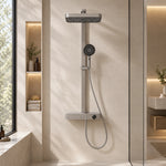 Brushed gunmetal shower system, mounted in beige shower area with recessed niches
