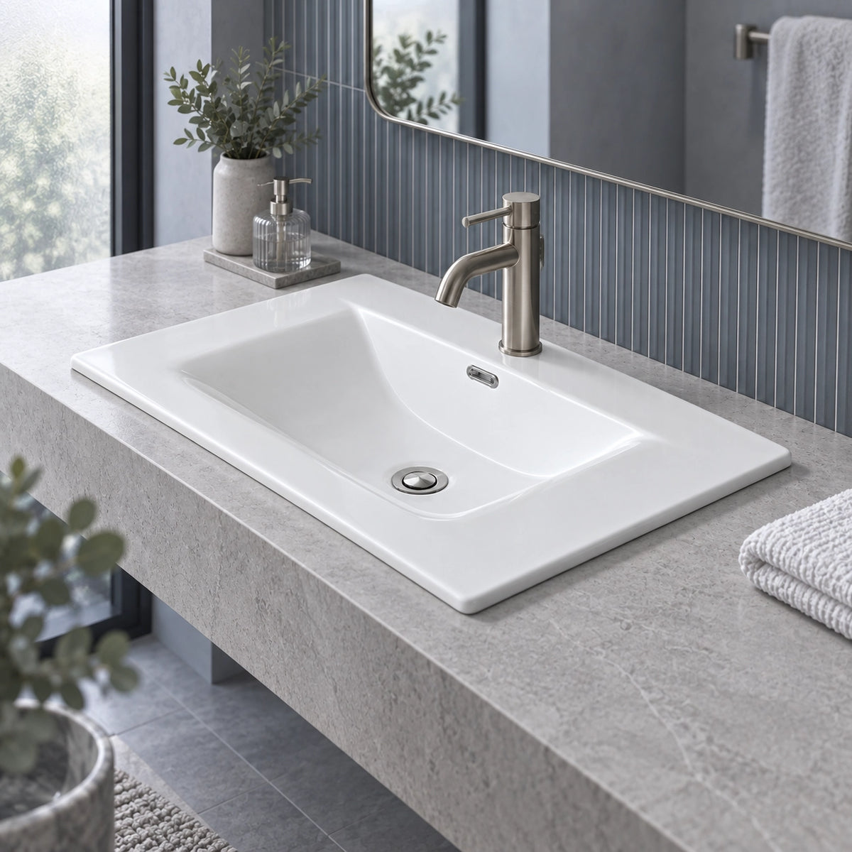 White ceramic vanity sink on grey stone countertop, modern bathroom