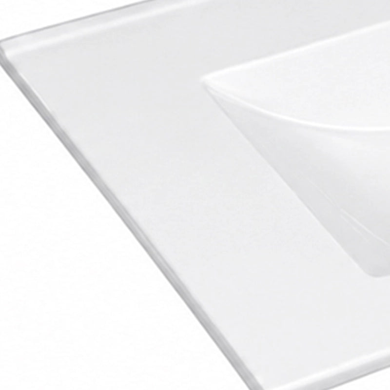 Close-up detail shot of white integrated ceramic vanity sink basin and countertop
