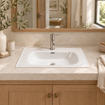 White ceramic oval undermount bathroom sink, bathroom lifestyle scene