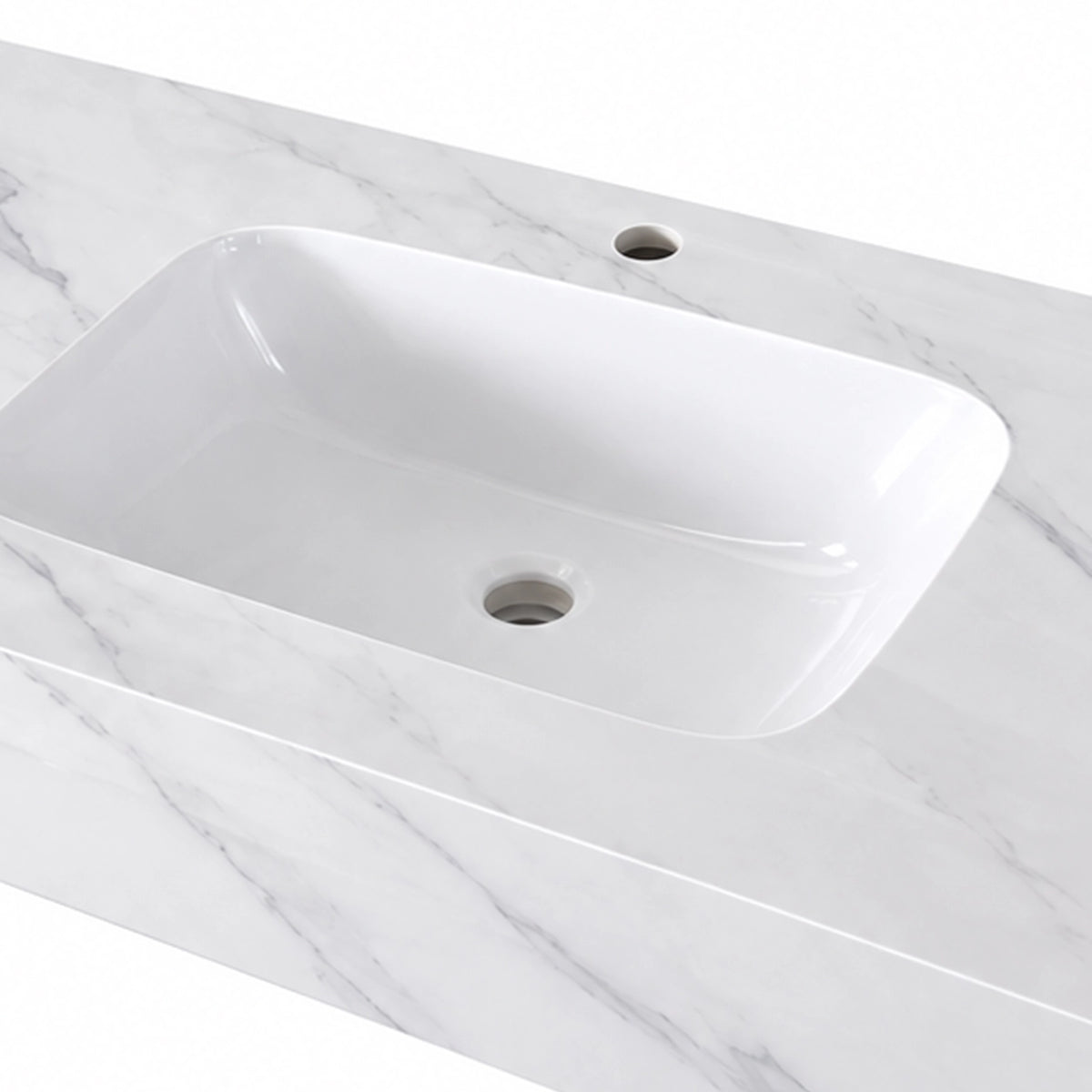 Close-up of Calacatta White glossy ceramic wall-mount sink, basin and drain hole detail