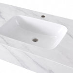 Close-up of Calacatta White glossy ceramic wall-mount sink, basin and drain hole detail