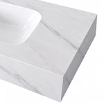 Calacatta White marble countertop edge detail, wall-mount sink surface closeup