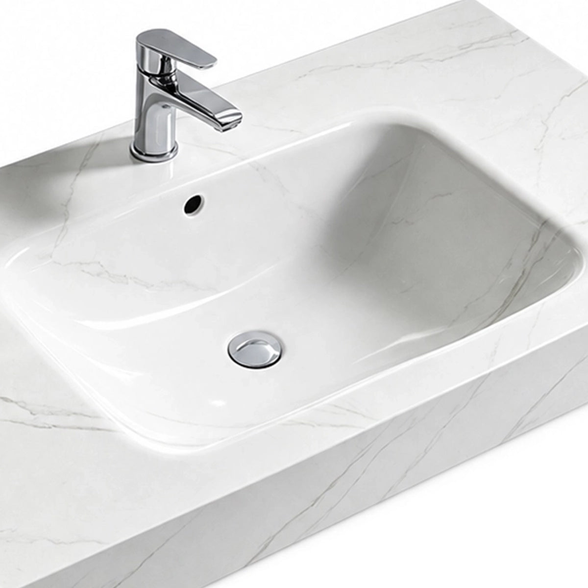 Close-up of Fish Maw White sintered stone wall-mount sink basin with chrome faucet and overflow hole
