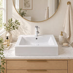 White rectangular ceramic semi-recessed bathroom sink installed in bright modern bathroom vanity setting