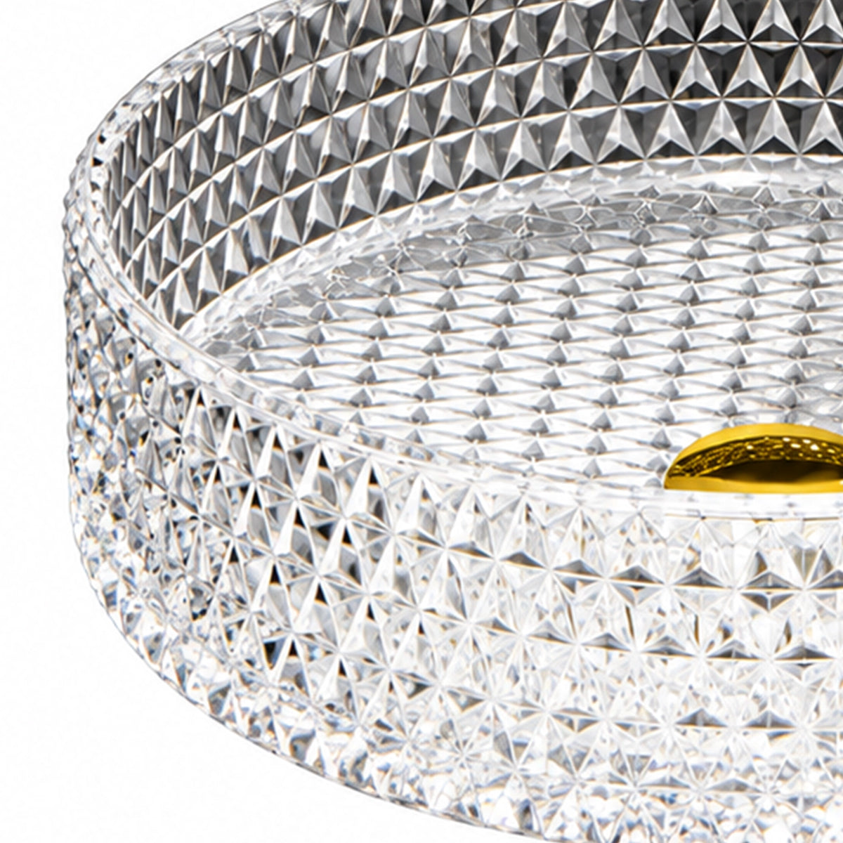 Close-up angled view of round diamond faceted clear glass vessel sink, showcasing intricate geometric crystal texture and gold drain