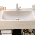 Close-up of cream rectangular wall mount sink basin texture