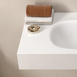 Oval Engineered Stone Wall-Mount Bathroom Sink, close up of sink surface and thick front edge