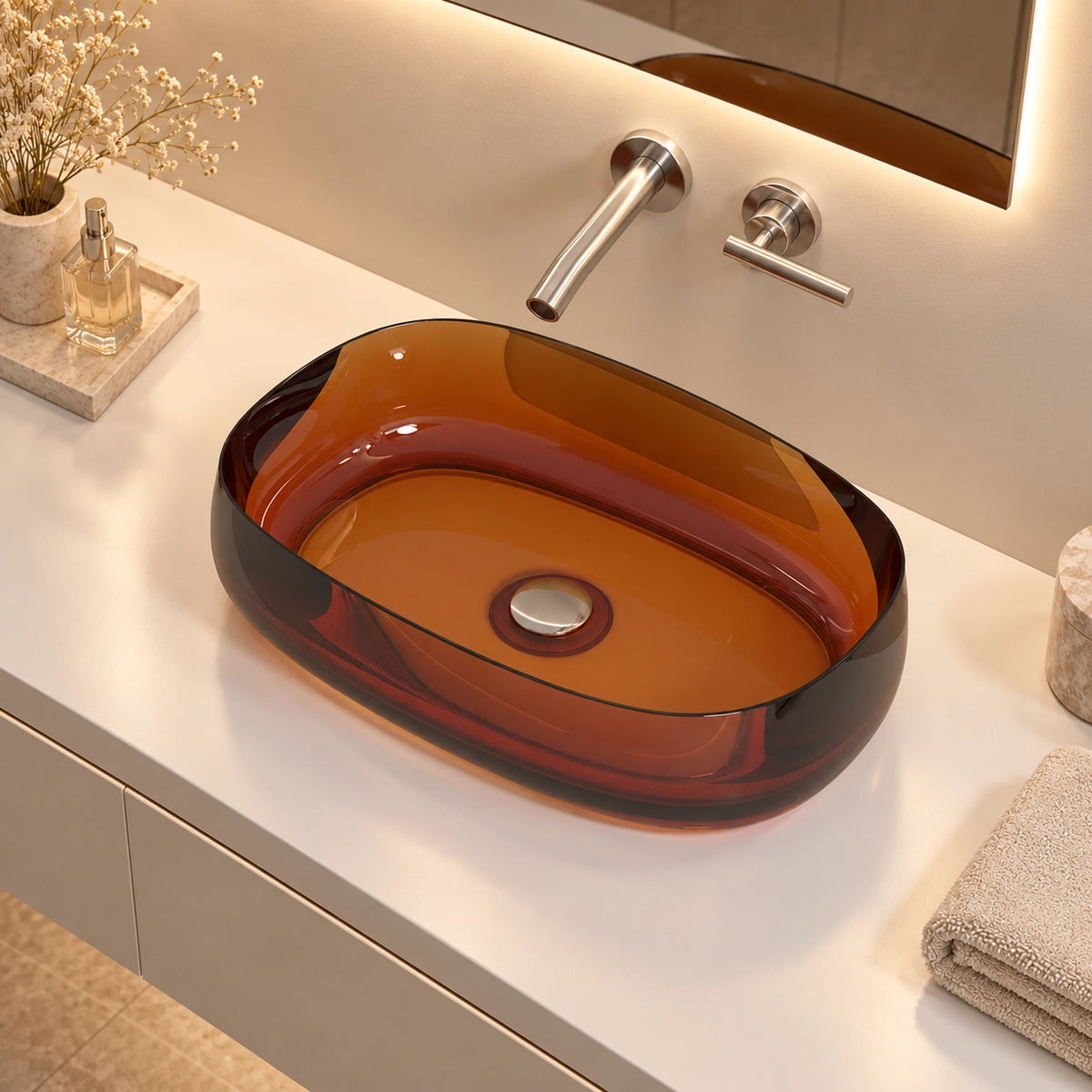 Orange-red oval resin vessel sink viewed from above on a bathroom vanity