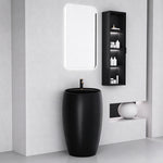 Black ceramic round pedestal bathroom sink with a modern freestanding design