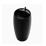 Black ceramic round pedestal bathroom sink with black and gold faucet