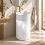 White stainless steel pedestal bathroom sink with fan-shaped basin and cylindrical pedestal base in a bright modern bathroom