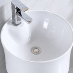 Close-up of white ceramic oval bathroom sink basin and faucet hole