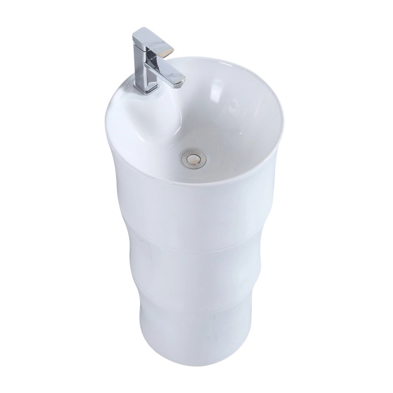 White ceramic oval pedestal bathroom sink with freestanding design
