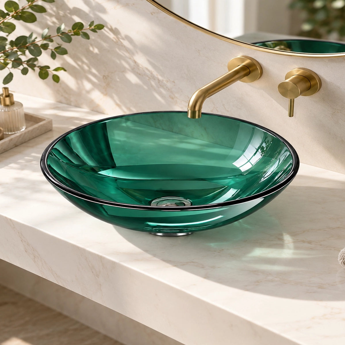 Green tempered glass round vessel bathroom sink with wall-mounted gold faucet on a marble countertop.