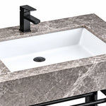 White ceramic rectangular basin with integrated overflow and black single-hole faucet, shown within a grey console bathroom sink countertop.