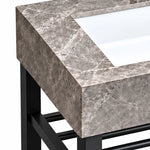 Grey ceramic rectangular basin with a marble-look finish and open black stainless steel support frame.