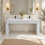 Console engineered stone double bathroom sink with two integrated basins and an open floor-mounted design in a bright modern bathroom.